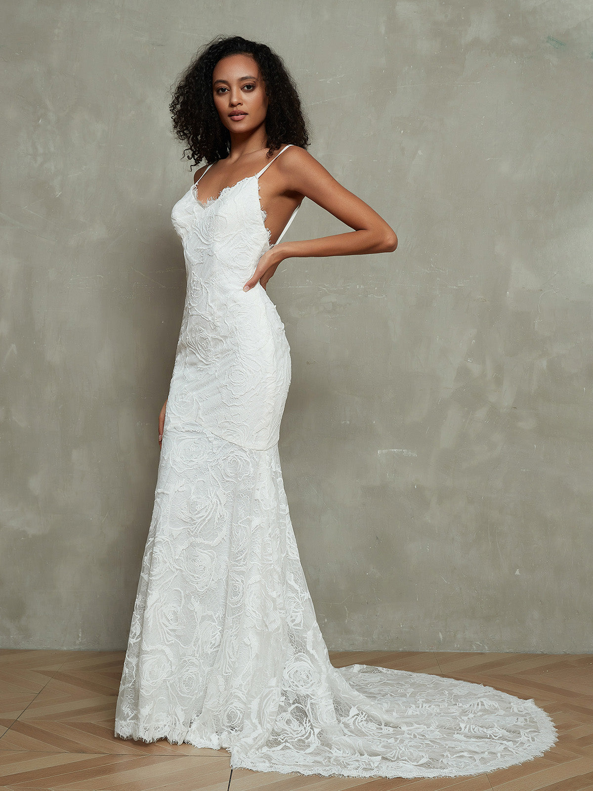 Classic ivory a-line wedding dress with lace applique and sheer illusion  straps